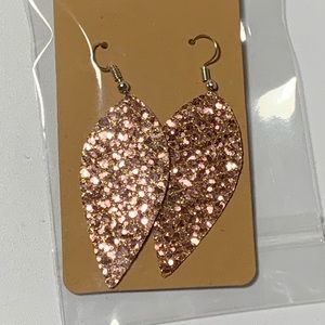 Gorgeous rose gold leaf shaped leather earrings